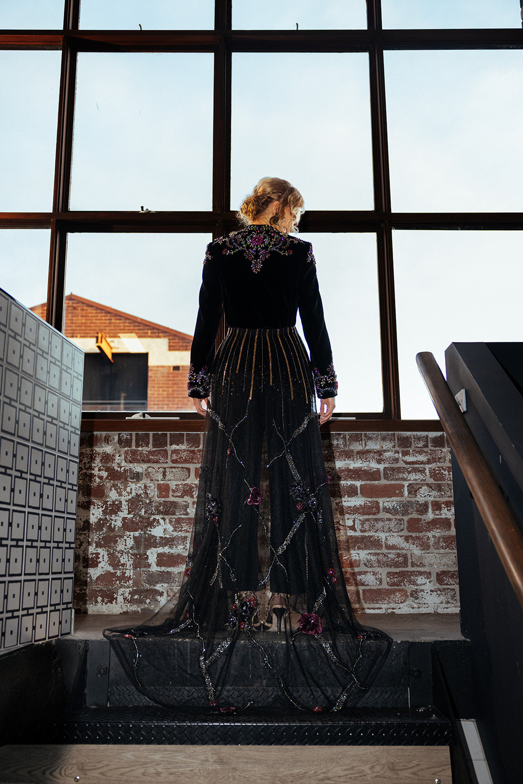 Full length: the Elsa embroidered velvet jacket over the Natalia tulle train, with the Goldie Sensu earrings